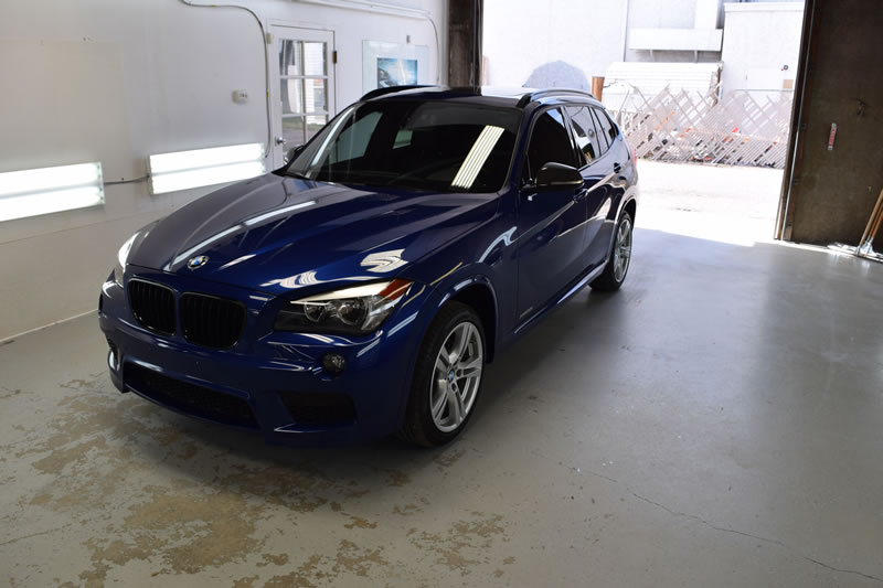 BMW X1 Drk Blue 18 plat and bumper