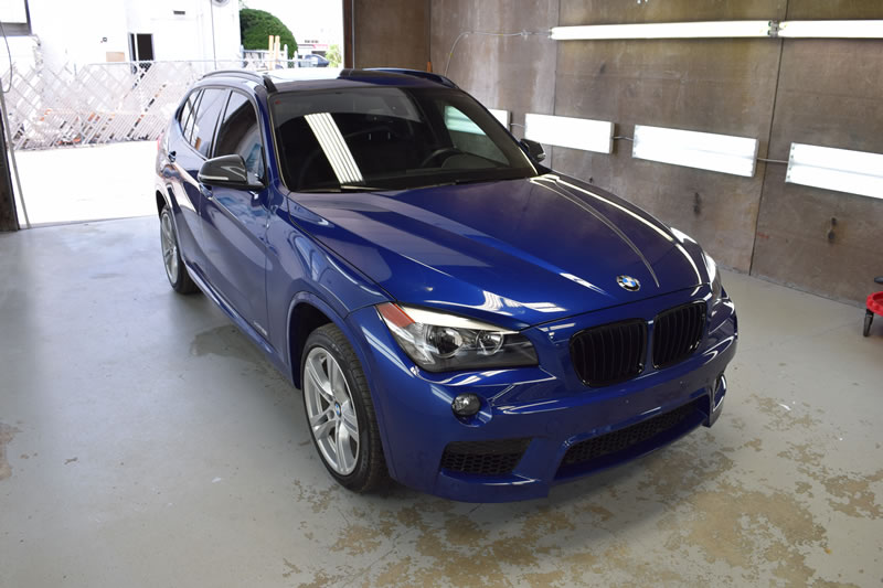 BMW X1 Drk Blue 18 plat and bumper