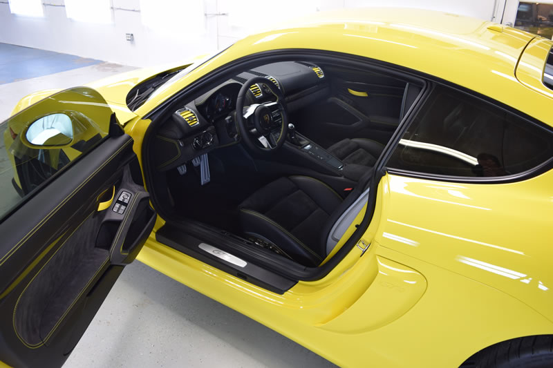 Yellow Porsche Cayman GT4