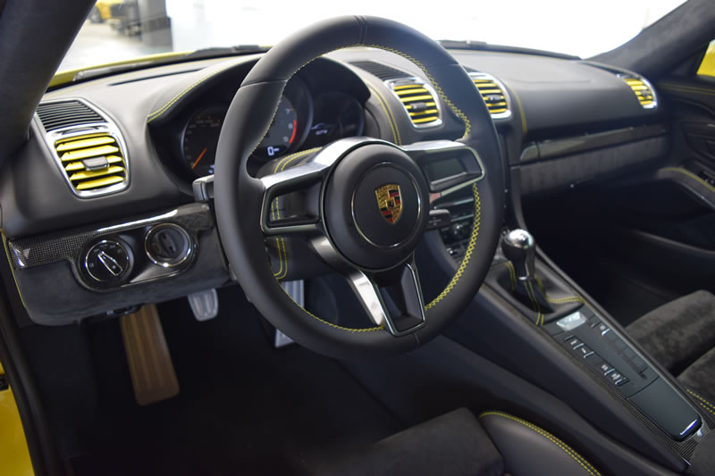 Yellow Porsche Cayman GT4