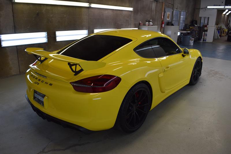 Yellow Porsche Cayman GT4