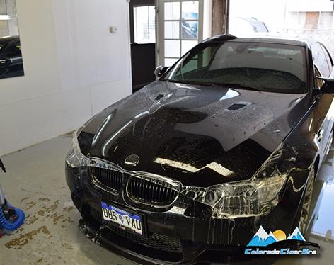 Black BMW M3 getting clear bra