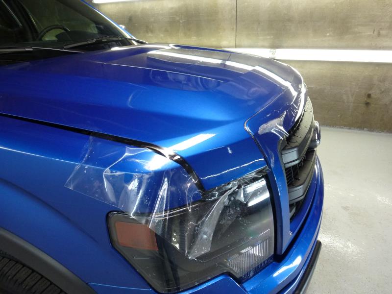 Blue Ford F-150 clear bra application