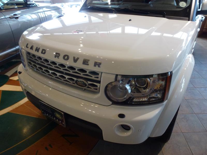 White Land Rover in the showroom