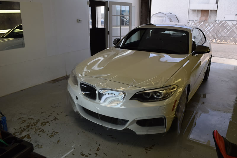 White BMW getting clear bra