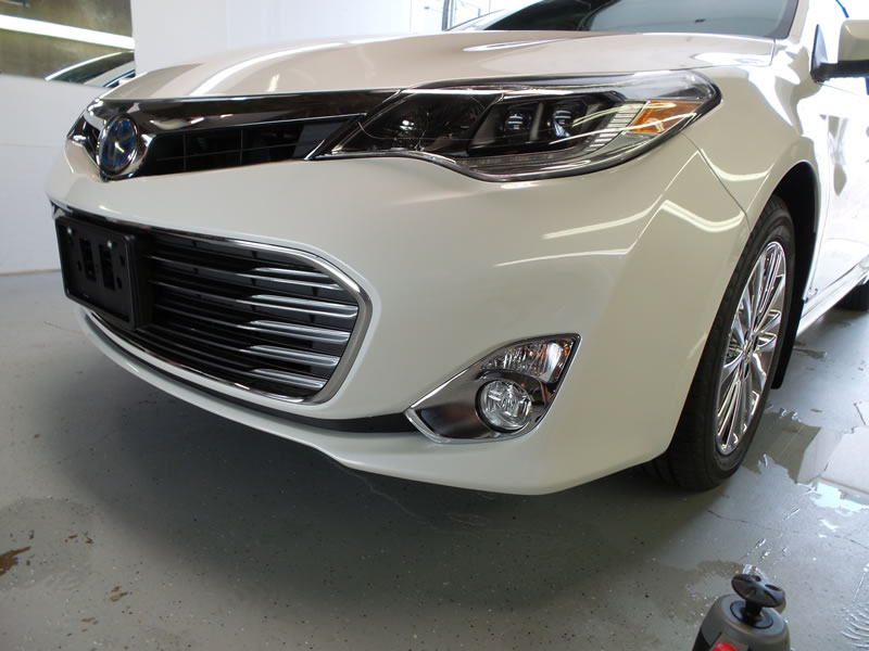 White Toyota Camry receiving clear bra