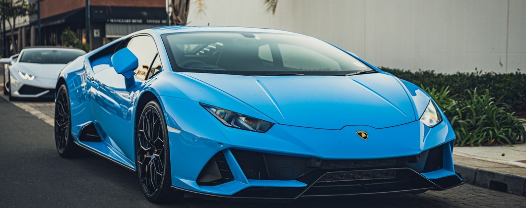 ceramic coating on blue sports car in Denver