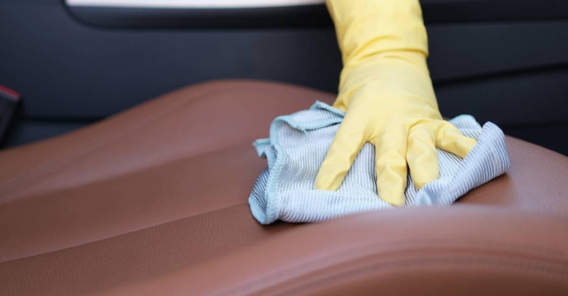 applying opti guard leather to car seat
