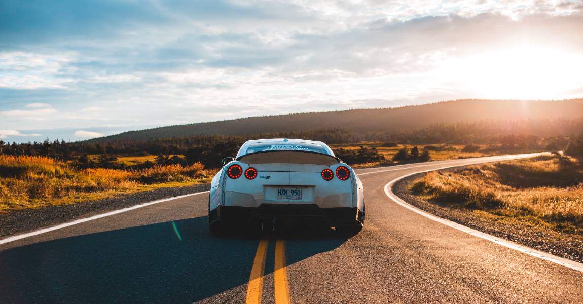 ceramic coated sports car driving in hot climate