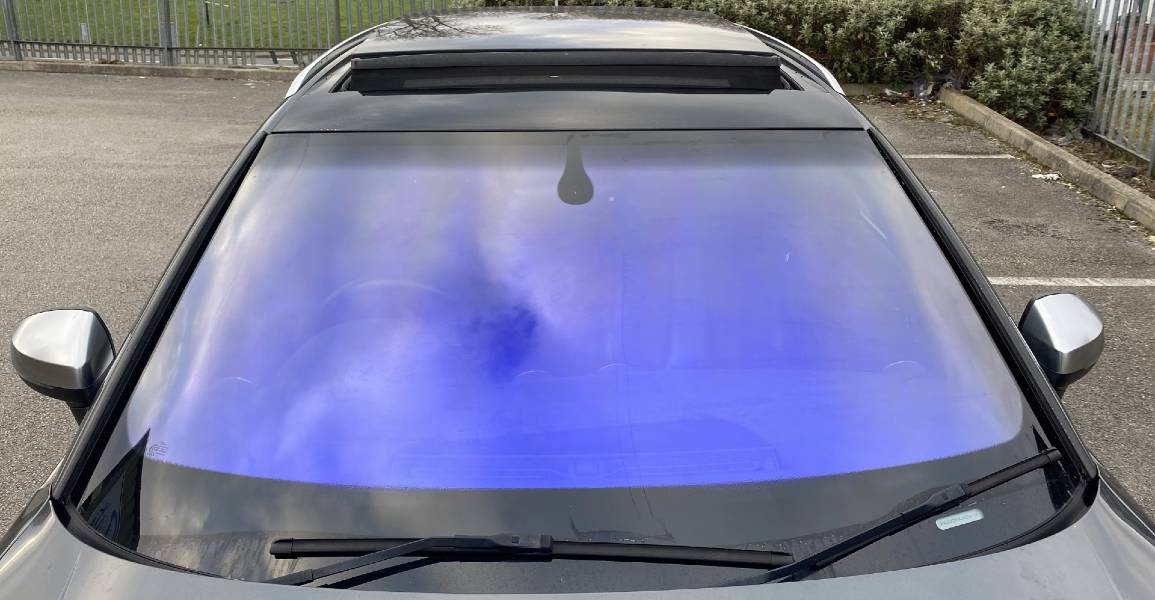 vehicle windshield tinted blue hue color