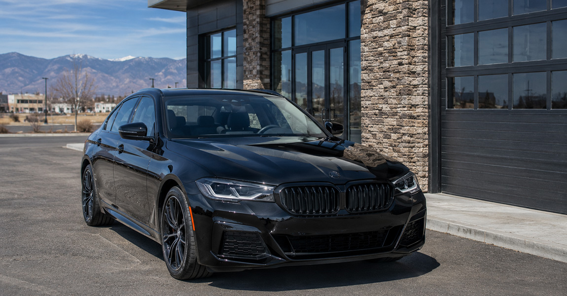 Luxury sedan with windshield protection film installed at Colorado Clear Bra in Arvada, Colorado